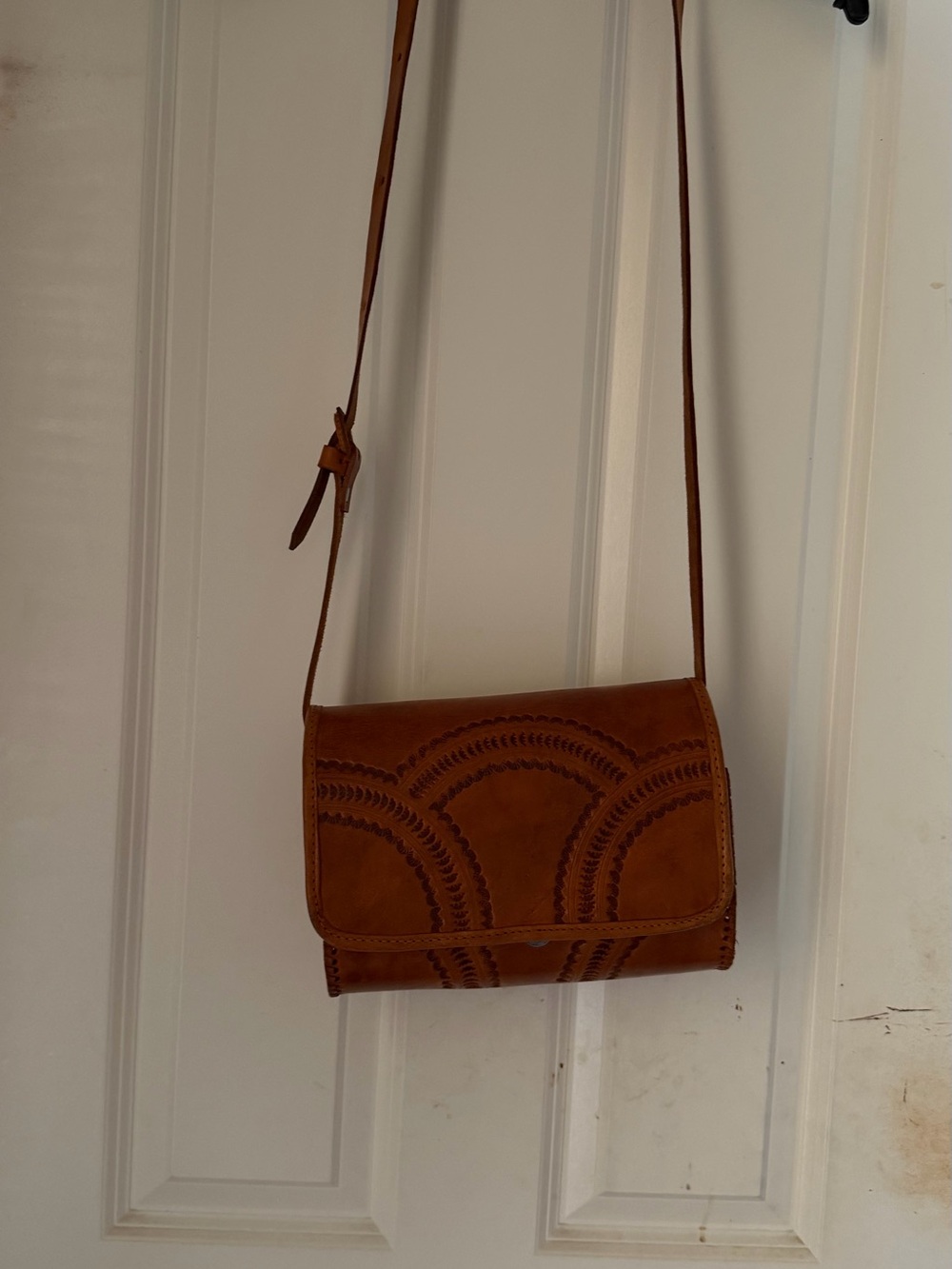 Women's Tan leather Crossbody Bag made in Mexico it hangs 31 inches long